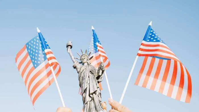 hands-waving-american-flags